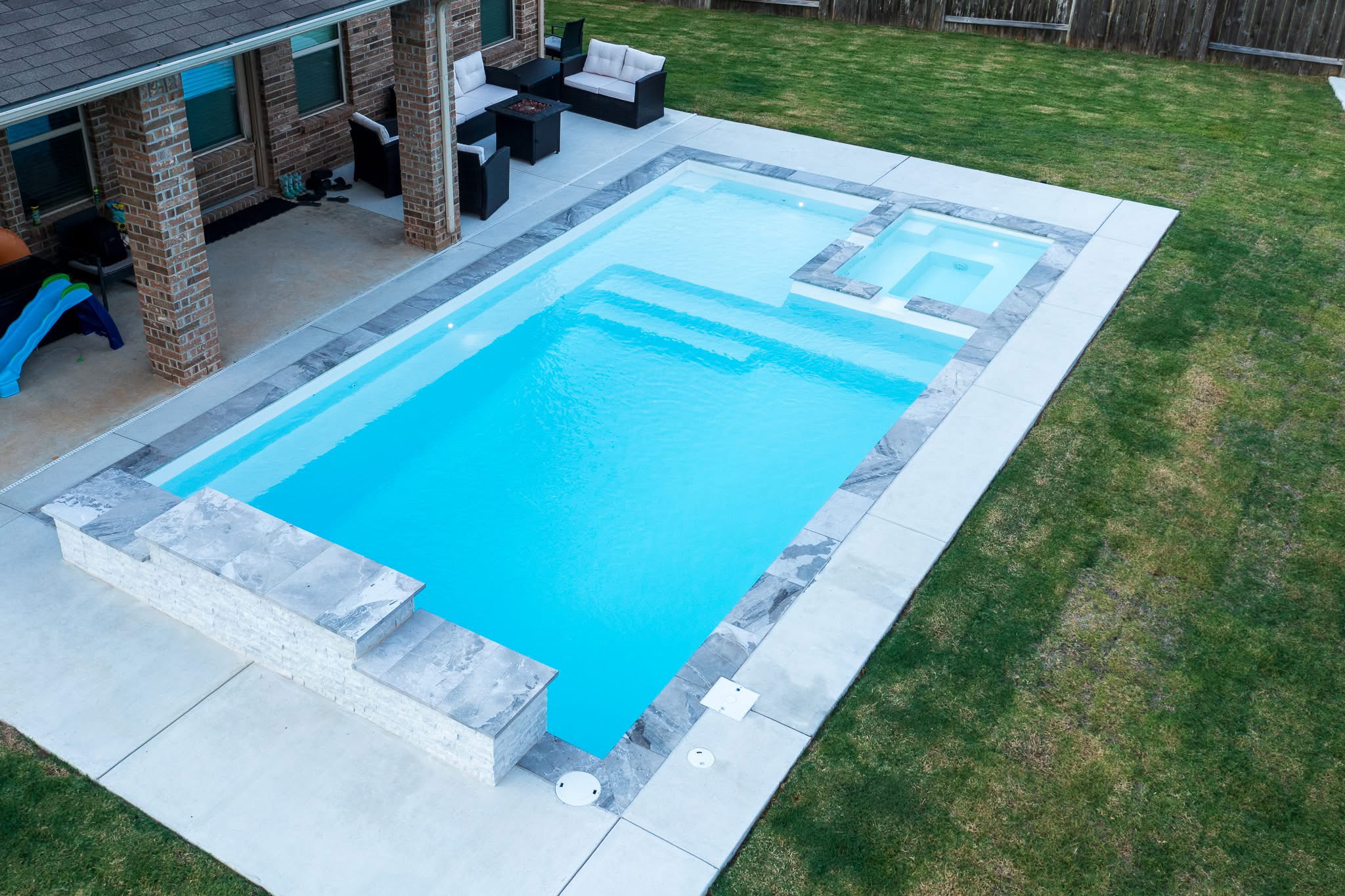 The Intrigue fiberglass pool