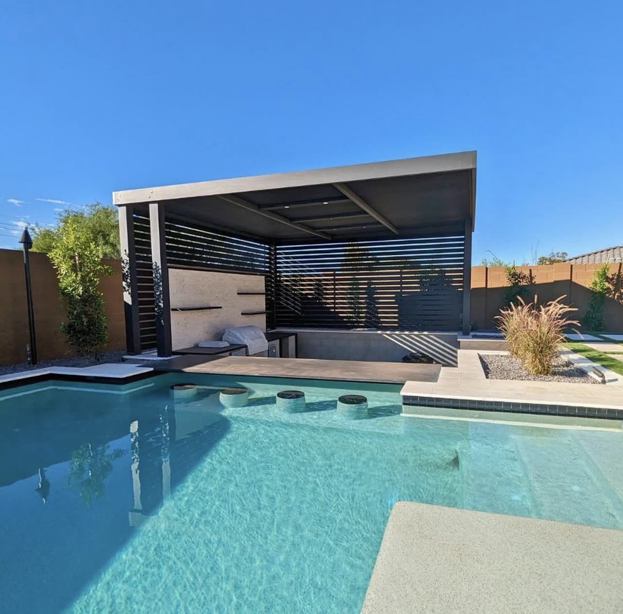 Attached aluminum patio cover on a Front Range home in Parker, Colorado